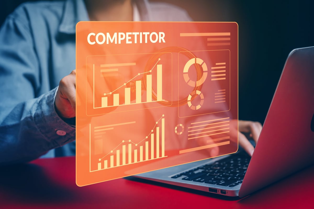 Hand interacting with competitor analysis display, market comparison insight, strategic advantage review, performance measurement, business intelligence, competitor concept