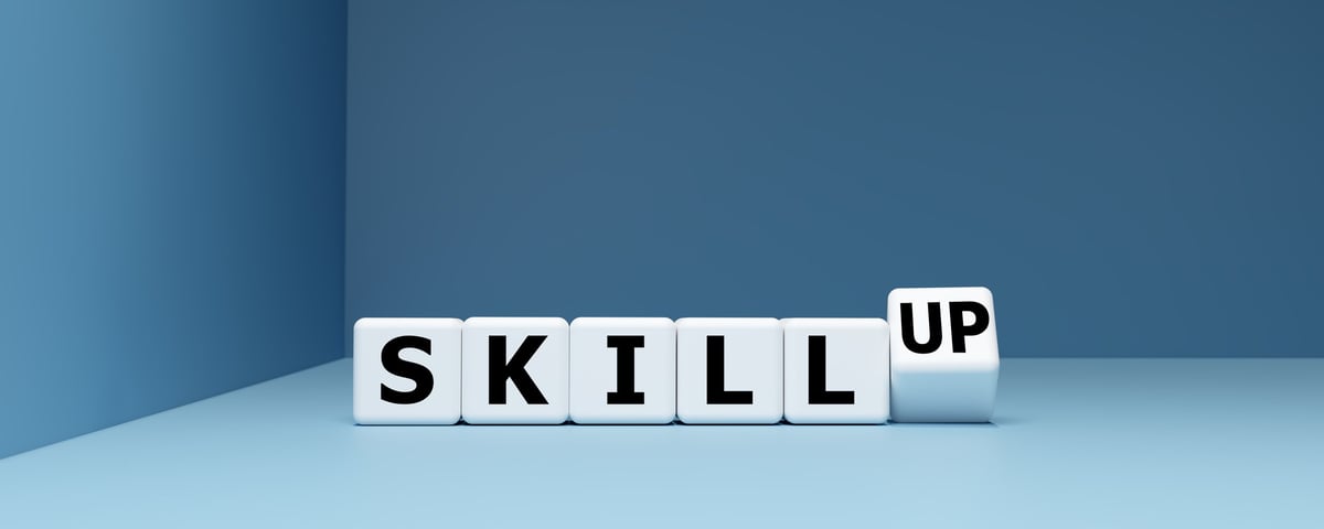 SKILL UP blocks symbolizing career development and continuous learning
