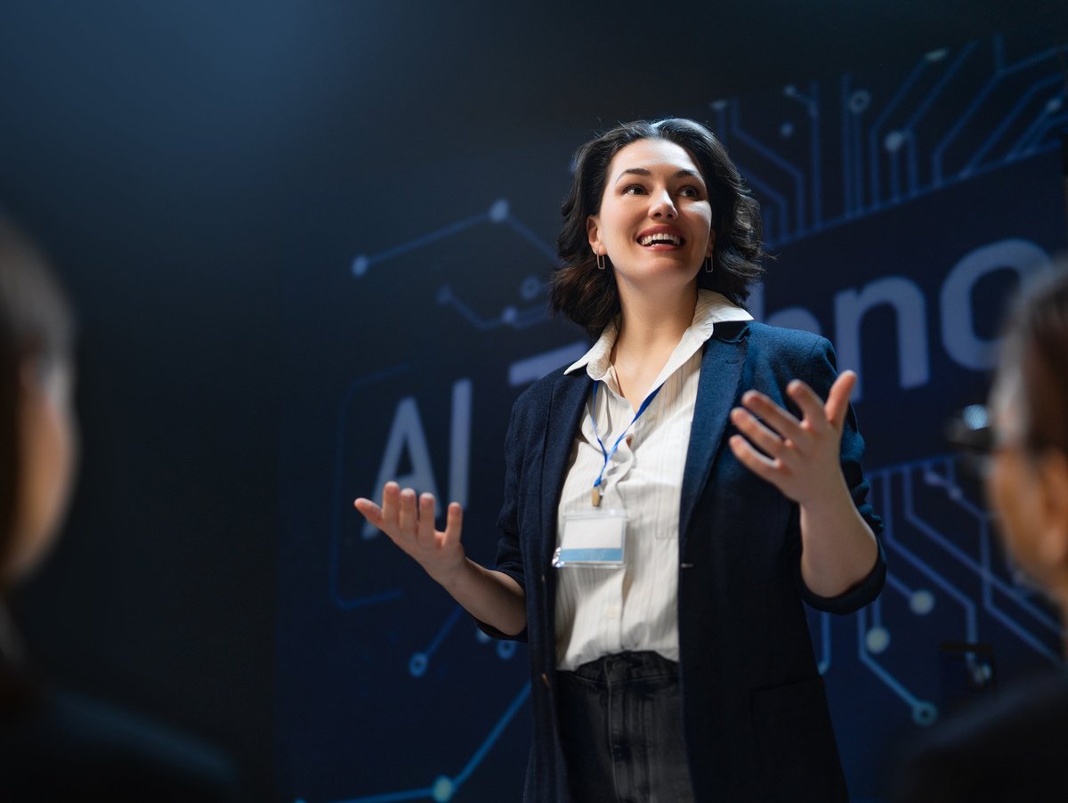 Empowering image of a confident female professional presenting groundbreaking AI concepts